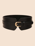Black leather belt with a gold buckle on a beige background