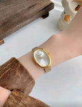 Women’s Large Round Vintage Quartz Watch – Gold